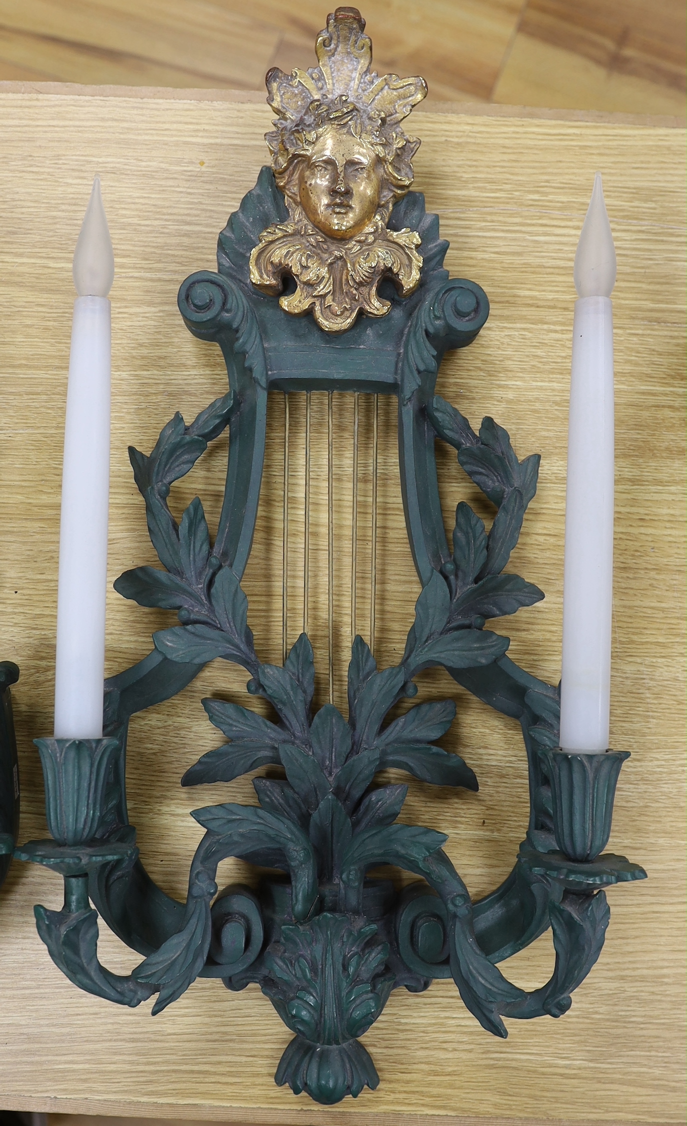 A pair of lyre shaped green resin wall lights, height 62cm